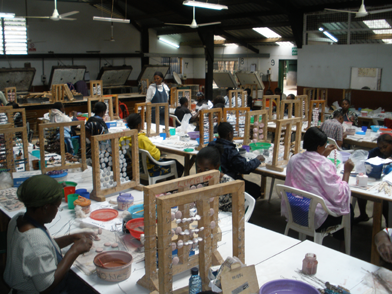 kenyan women work at their art